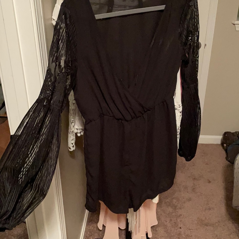 Black romper with lace arms